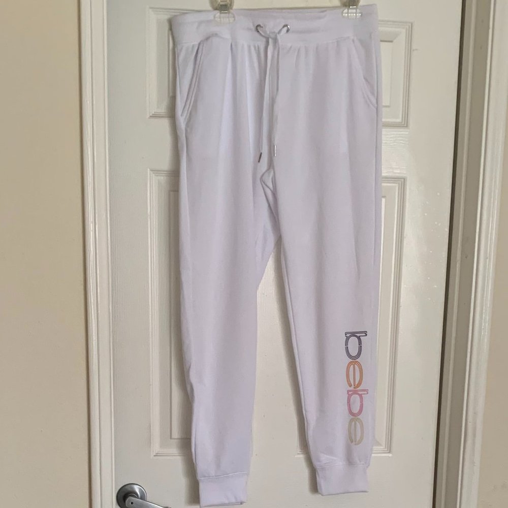 New without tag. bebe white sweatpants. Size L